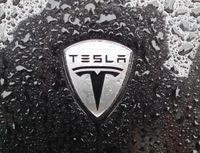 wp3544559-tesla-logo-wallpapers